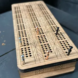 Cribbage board with storage