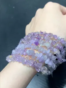 Candice(12650)gc.This amethyst bracelet is breathtakingly beautiful, with its delicate purple hues and natural, irregular stones that shimmer like captured twilight.