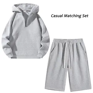 Unisex two-piece set: long-sleeve half-zip hooded sweatshirt and shorts; casual solid-color neutral streetwear set, long-sleeve version.