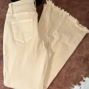 Mid Waist Flared Jeans
