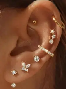 GANIA Small Earrings Set of 7 Pairs, 14K Gold Coated. Water-resistant, durable, rust-proof, long-lasting lustrous, hypoallergenic earring set. Suitable for various pierced jewelry and can be freely combined with different styles for all-day use.