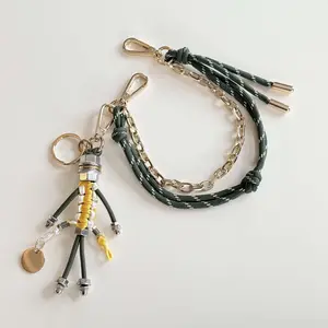 Bag charm with cord and chain in seaweed