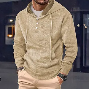 Men's beige textured pullover hoodie with buttons, kangaroo pocket, stylish & cozy, suitable for street style and everyday wear