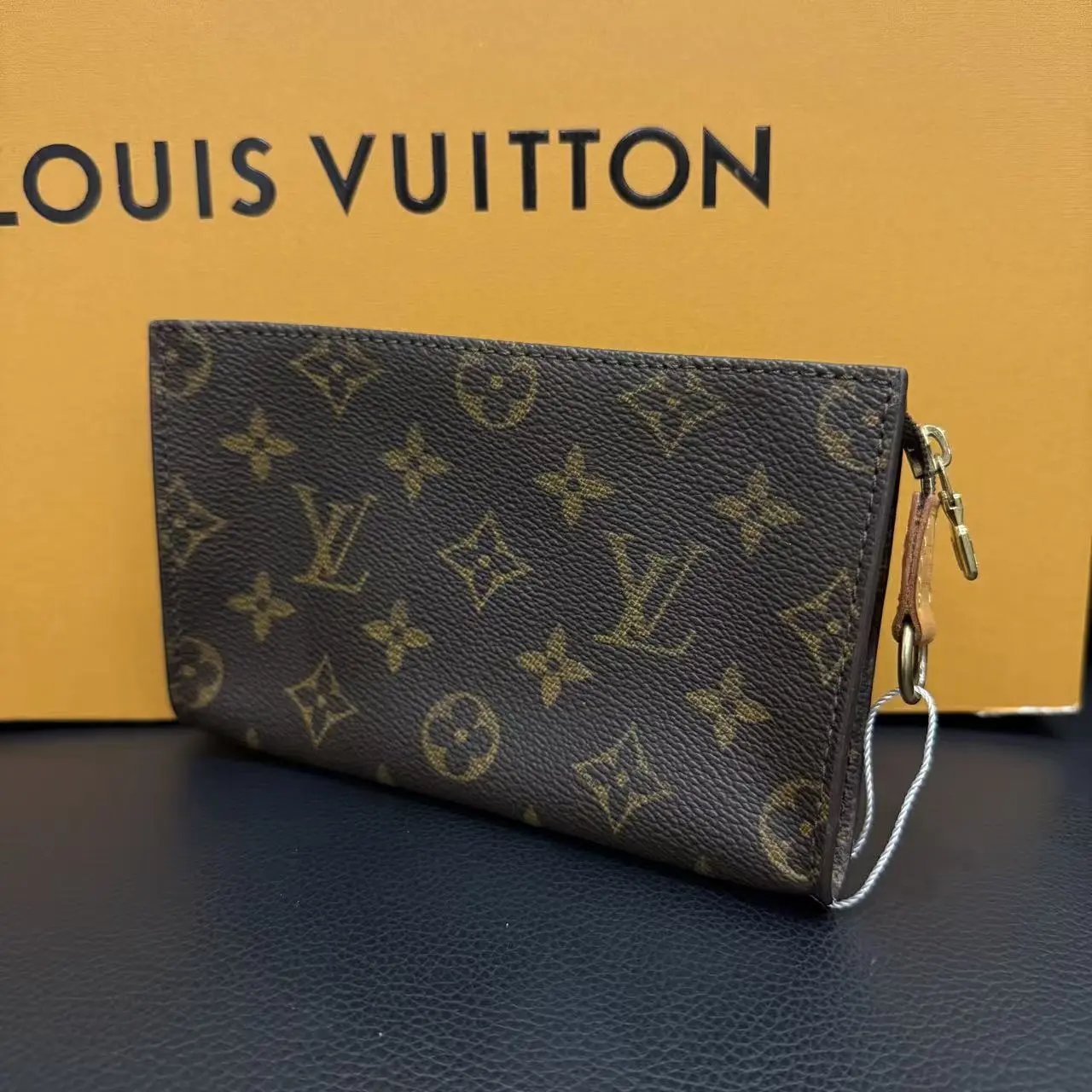 Pre-owned LOUIS VITTON as shown Clutches and wristlets Clutches & Wristlets Pre‑Loved Louis Vuitton Monogram Bucket PM Pouch Vintage LV Small Zip Pouch