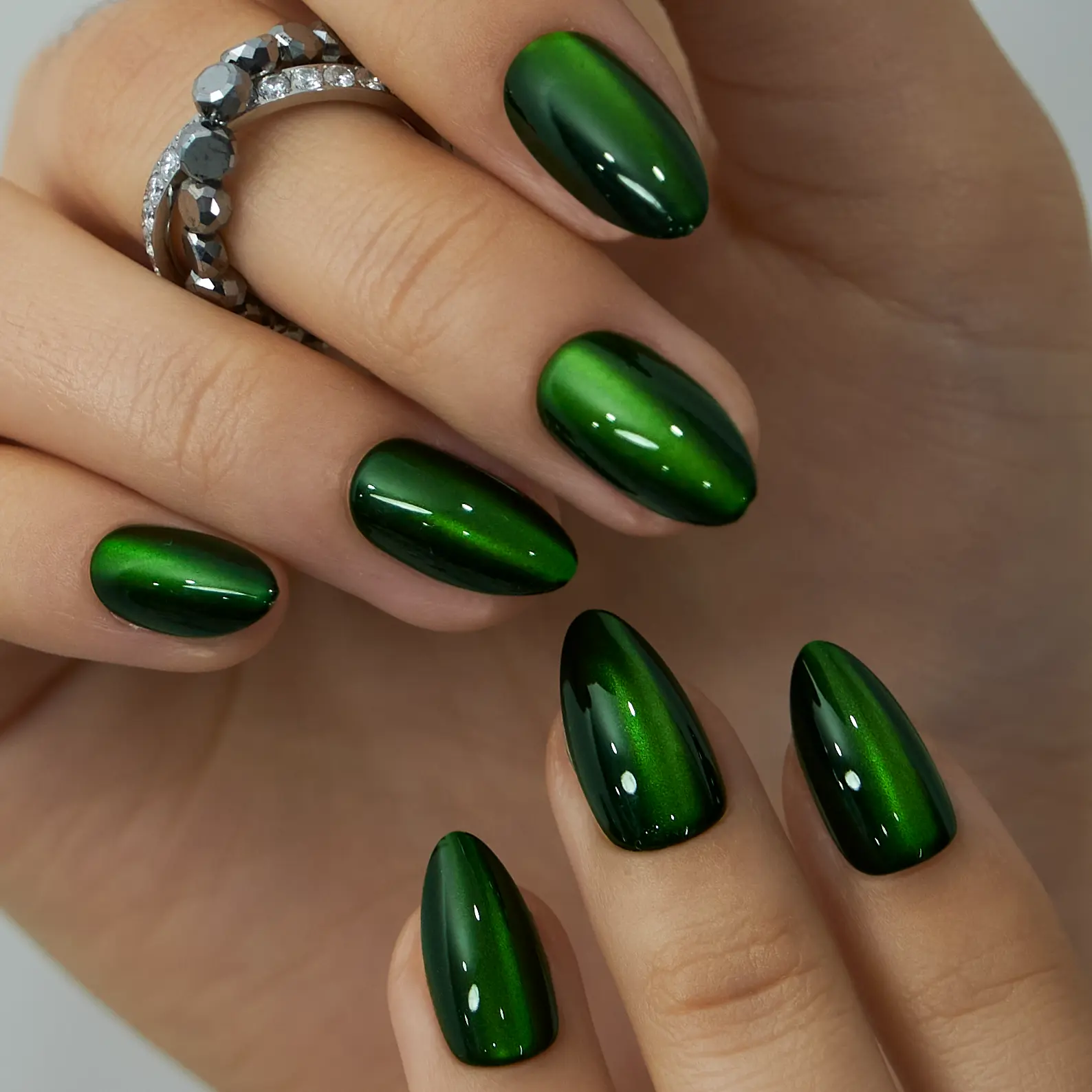 CurvLife Nailora medium almond gel press on nails green glossy-shiny cat-eye with designs last 2 weeks