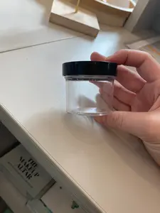 The Makeup Altar 2x2 clear container with black screw cap