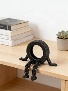 1pc Small Sitting Tire Buddy Sculpture - A Collectible Figure with Movable Joints, Perfect for Decorating Your Car Interior, Desk, Or Computer, As Well As for Home Decor, Excellent Gift Option for Loved Ones