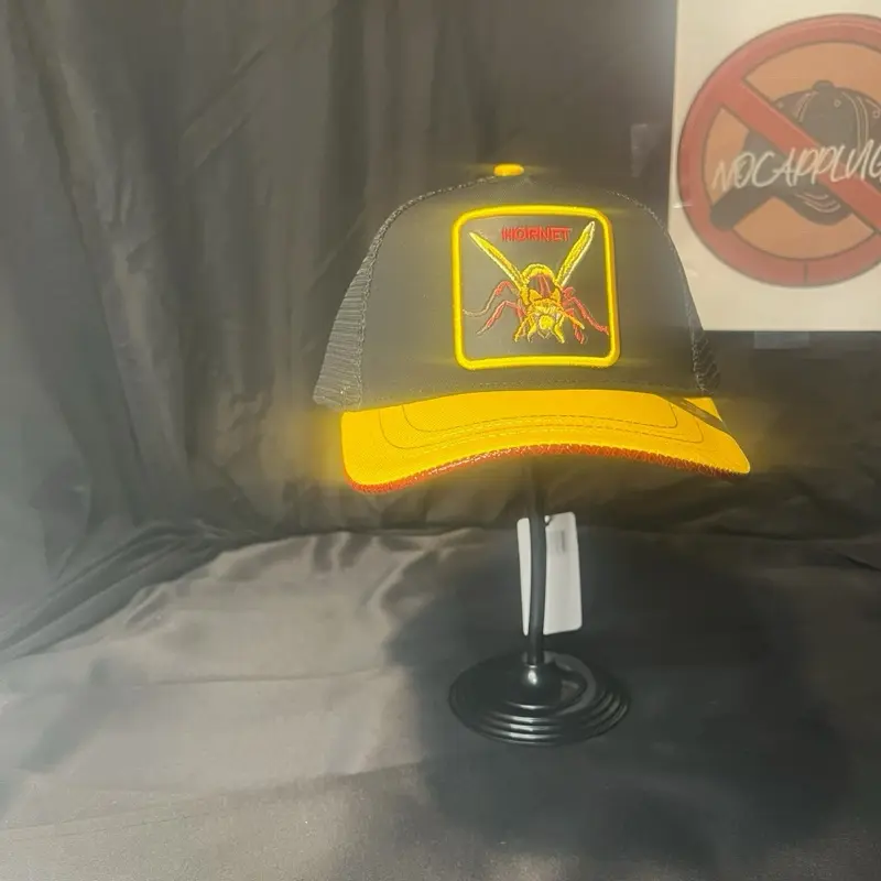 Hornet Trucker Cap with Yellow Brim - Simple Design Featuring a Yellow Emblem and Brim Color