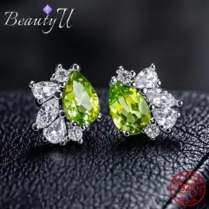 A Pair of 925 Sterling Silver Stud Earrings Featuring Pear-Cut Natural Peridot And Amethyst Gemstones, Ideal As a Daily Accessory Or a Gift, Perfect for Women And .