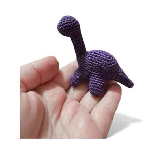 Itty bitty dinosaur keychain friend