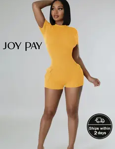 JOYPAY Sexy Ribbed Backless Romper for Women Short Sleeve Slim Fit Playsuit with Pockets Summer Clubwear Jumpsuit Outfit Chic Streetwear Fashion Fabric Coral Pink Stretchy Breathable