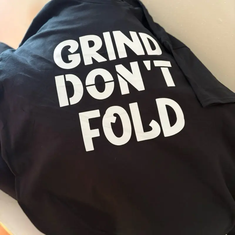 GDF Tee - Grind Don't Fold Black Apparel with Bold White Text