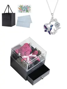 "Hummingbird Rose · True Love". A sleek, fade‑resistant luxury hummingbird and rose gem necklace. Comes with a preserved rose moss bear gift box and a card for moms or daughters. Ideal mysterious gift for holidays and Mother’s Day.