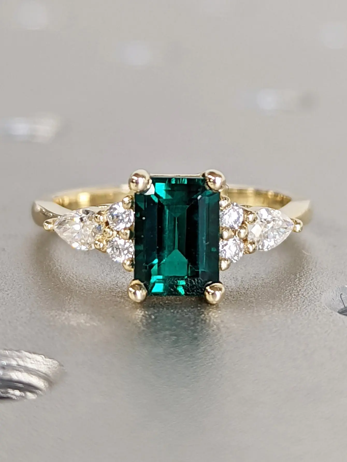 Women’s vintage emerald-cut green cubic zirconia ring, gold-tone rectangular center stone with pear & round CZ accents, statement wedding promise jewelry gift for her engagement