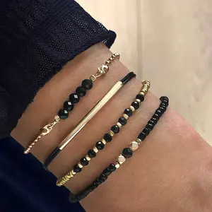 4pcs Bohemian Style Beaded Bracelet Set, Mixed Black and Golden Glass Beads, Adjustable Stackable Bangle Collection for Daily and Gift Occasions