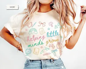 Comfort Colors Helping Little Minds Grow Shirt, Kindergarten Teacher Shirt, Daycare Teacher Shirt, Back To School 2026 Shirt, New Teacher Gift