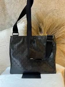 Pre-owned GUCCI Men's Messenger Bag Black Leather with Embossed Pattern & Adjustable 1919