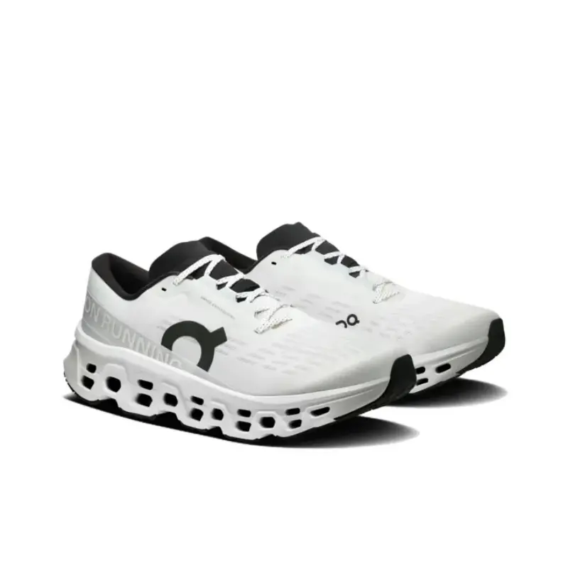 Cushioned hollow foam unisex athletic training footwear, off-white ventilated woven upper, matte dark graphic side prints, suited for gym sessions paved trail walks casual half-marathon practice runs