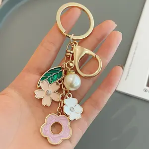 Small Fresh Sakura Key Ring - Metal Pearl Flower Design, Versatile as Keychain & Bag Pendant, Ideal for Girls' Handbags