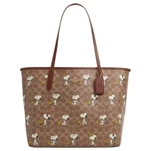 COACH x Peanuts Snoopy City 33 Tote Bag with Logo Print and Coated Canvas for Women in Brown