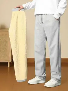 Men's solid color fleece casual pants, thicker and warmer with added fleece lining, suitable for winter leisure wear, ideal for outdoor activities and everyday style.