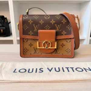Pre-owned Louis Vuitton Coated Canvas Shoulder Bags Reverse Monogram Dauphine Mini
