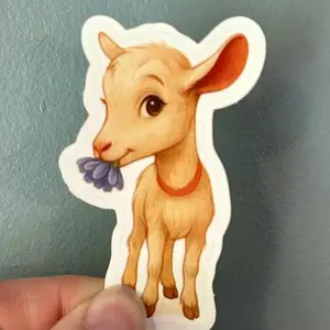 Meadow the Baby Nigerian Dwarf Goat Eating a Flower Vinyl Sticker