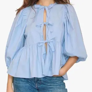 Tie Front Babydoll Tops for Women. Also known as a Peplum Top or a Couquette Top. Blue