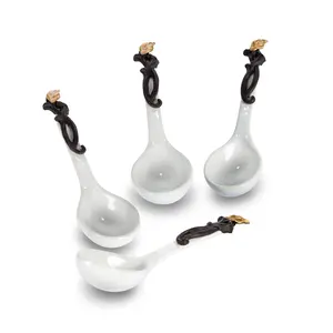 White Stoneware Spoons.