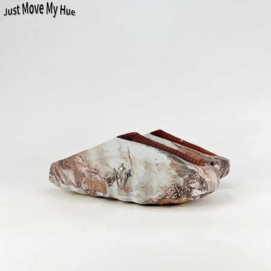 All-day lightweight slip-on mule slides feature smooth printed canvas uppers, consistent earth marble brown stone print base matched with terracotta red woven strap, breathable perforated inner mesh, bendable full foam cushioned sole
