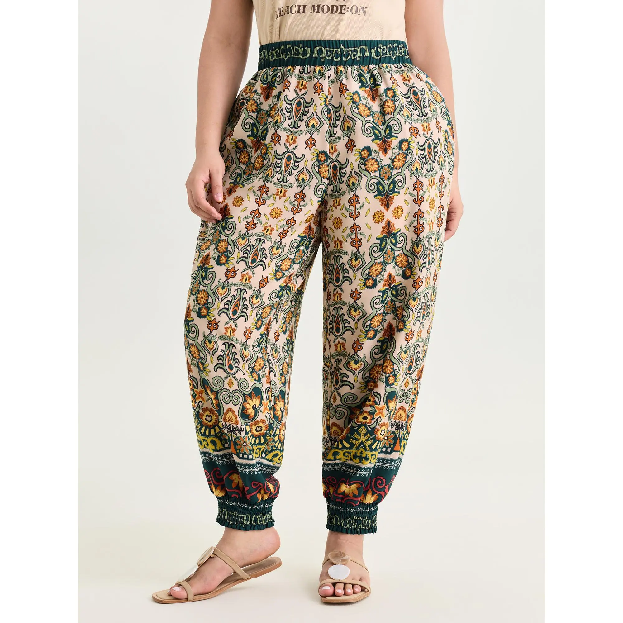 BloomChic Women's Plus Size Ethnic Floral Boho Pants featuring a Smooth Fabric, Smocked Mid Rise Waist, Pockets and Tassel Drawstring, Spandex, Garment, Multicolor, Plus Size Flowy Pants, Chic Curve Pants