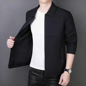 A men's lapel jacket, featuring a stylish casual design with a classic yet fashionable lapel shape. The zippered pocket details add trendy touches to the overall look. Available in a black base color, it's versatile and adds a sense of quality, making it