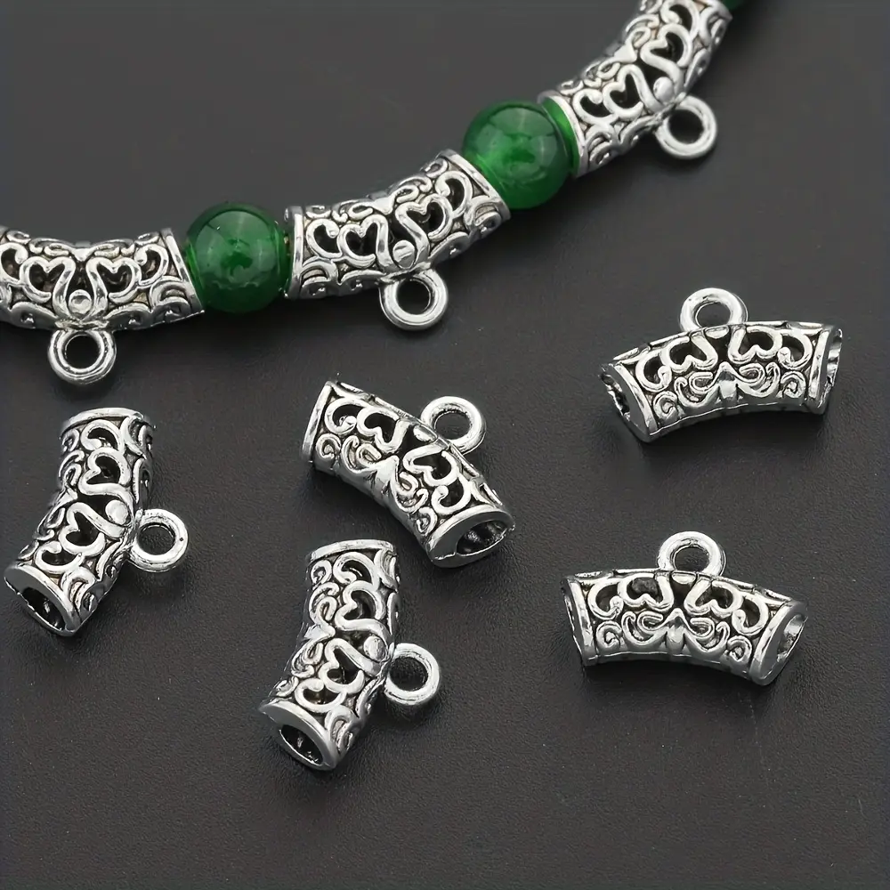 57 PCS alloy hollow curved heart-shaped floral pattern connectors, suitable for DIY jewelry making, bracelets, necklaces and earrings accessories. Diy Pendants
