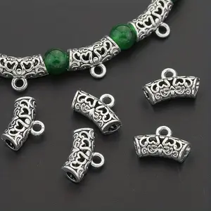 57 PCS alloy hollow curved heart-shaped floral pattern connectors, suitable for DIY jewelry making, bracelets, necklaces and earrings accessories.