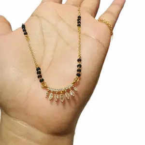 Gold chain with black beads Daily wear Mangalsutra for women Gold chain with black beads Daily wear Mangalsutra for women