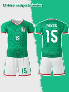 Green V-neck football suit for boys, with name REYES and number 15. It is a comfortable and breathable two-piece jersey for matches and sports, suitable for outdoor exercise, school team equipment, and a great gift for festivals.