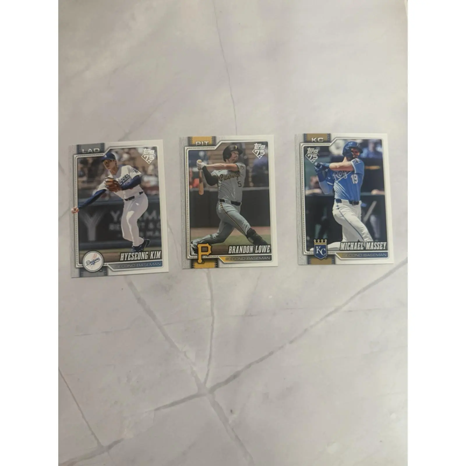 Set of 3 Baseball Cards Featuring Players from Various Teams and Leagues