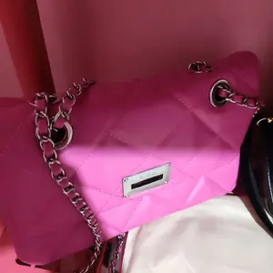 Claasy Pink Handbags - Fashion Accessory with Chain Detailing