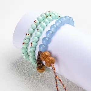 Multi-layered bracelet with blue glass beads, cute and bright, featuring a pink gemstone charm in Chinese style—jewelry, gift