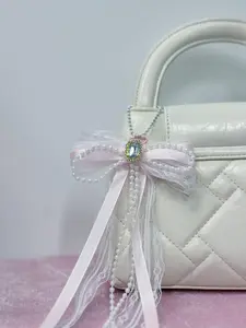 Cute lace bow—can be used as a bag charm, key chain, car ornament, or decorative accessory; it’s a gift suitable for a best friend.