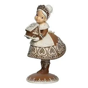 Gingerbread Mrs. Claus with Gingerbread House Roman