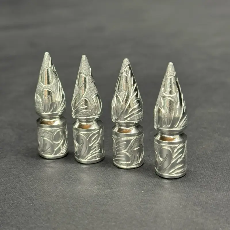 Hand engraved valve stem caps Hand engraved valve stem caps