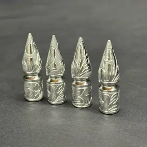 Hand engraved valve stem caps