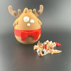 3D Printed Articulated Christmas Reindeer Dragon With Reindeer Egg Fidget Toy Featuring Festive Red Bow and Detailed Antlers