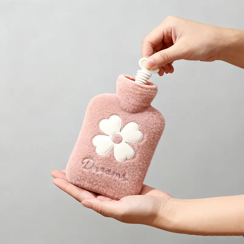Dusky pink clover embroidered plush hot water bottle, 500ml with a removable cover, fillable type, helps prevent electric leakage.