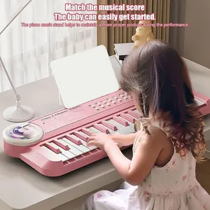 A music keyboard with clear sound, 37 keys, 5 instrument sounds, microphone, Electronic Keyboard, instrument toy, music learning keyboard toy, Musical Exploration, can be plugged in via USB, can be used with AA batteries (AA batteries need to be provided)