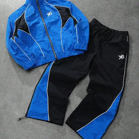 This men's two-piece tracksuit, Stylish casual tracksuit, includes a turtleneck jacket and sweatpants, featuring a blue and black color-block design with a sheen, suitable for outdoor activities and casual wear, makes a great holiday gift
