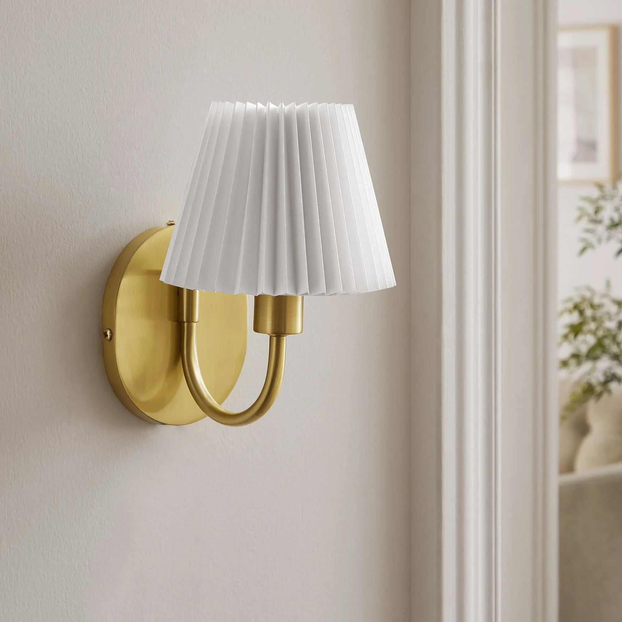 Wave Wall Sconce in Brass