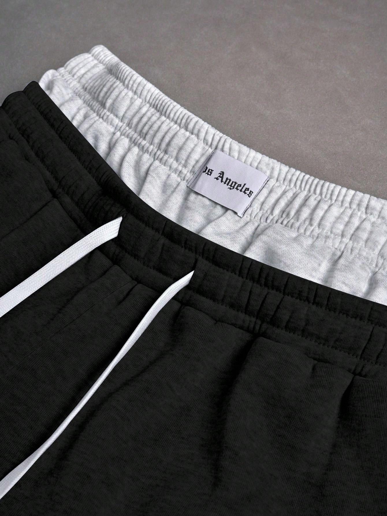 Gray sweatpants with embroidered logo, Y2K American street casual joggers, loose casual knitted sports pants featuring a drawstring and faux two-piece design with contrasting double waistband, perfect for everyday wear and trendy gatherings.