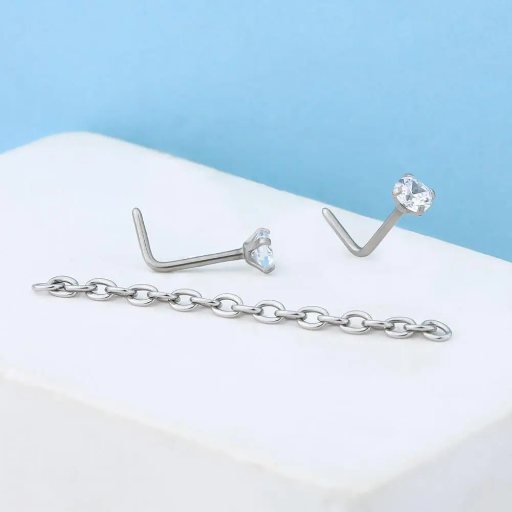 OUFER 20G Titanium L-Shaped Cubic Zirconia Nostril Nose Stud with Chain, AAA+ Inlay Unisex Dainty Nostril Nose Piercing Jewelry with Bling Effect for Daily Wear Body Accessory
